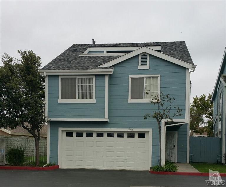 470 West Wooley Road Oxnard, CA 93030 - Photo 1 of 17 a front view of a house with a yard