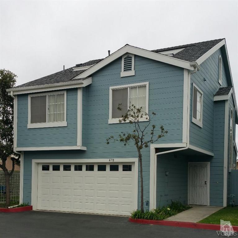 470 West Wooley Road Oxnard, CA 93030 - Photo 2 of 17 a front view of a house with yard