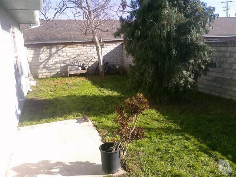 470 West Wooley Road Oxnard, CA 93030 - Photo 17 of 17 a view of a garden with a bench