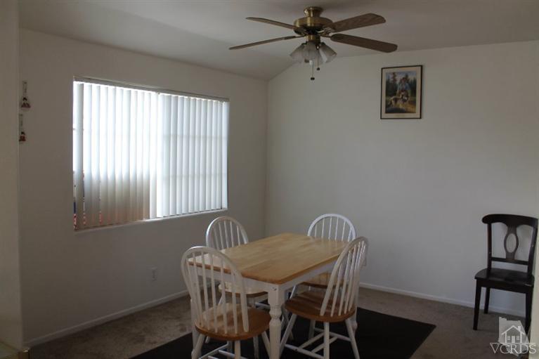 470 West Wooley Road Oxnard, CA 93030 - Photo 6 of 17 a view of a dining room with furniture and a window