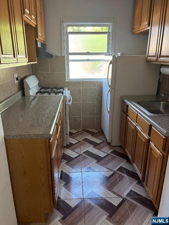 476 Washington Avenue, Unit 2 Hackensack, NJ 07601 - Photo 9 of 9 a room with storage and utility