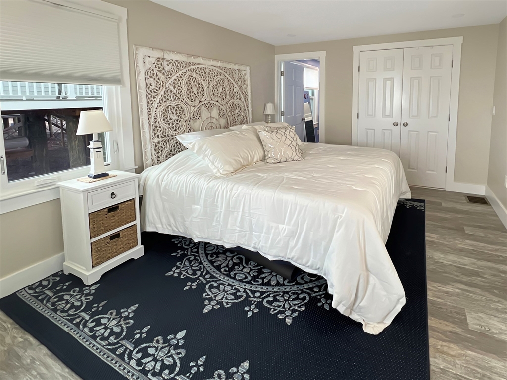 296 Central Avenue Scituate, MA 02050 - Photo 23 of 37 a bedroom with a bed and a window