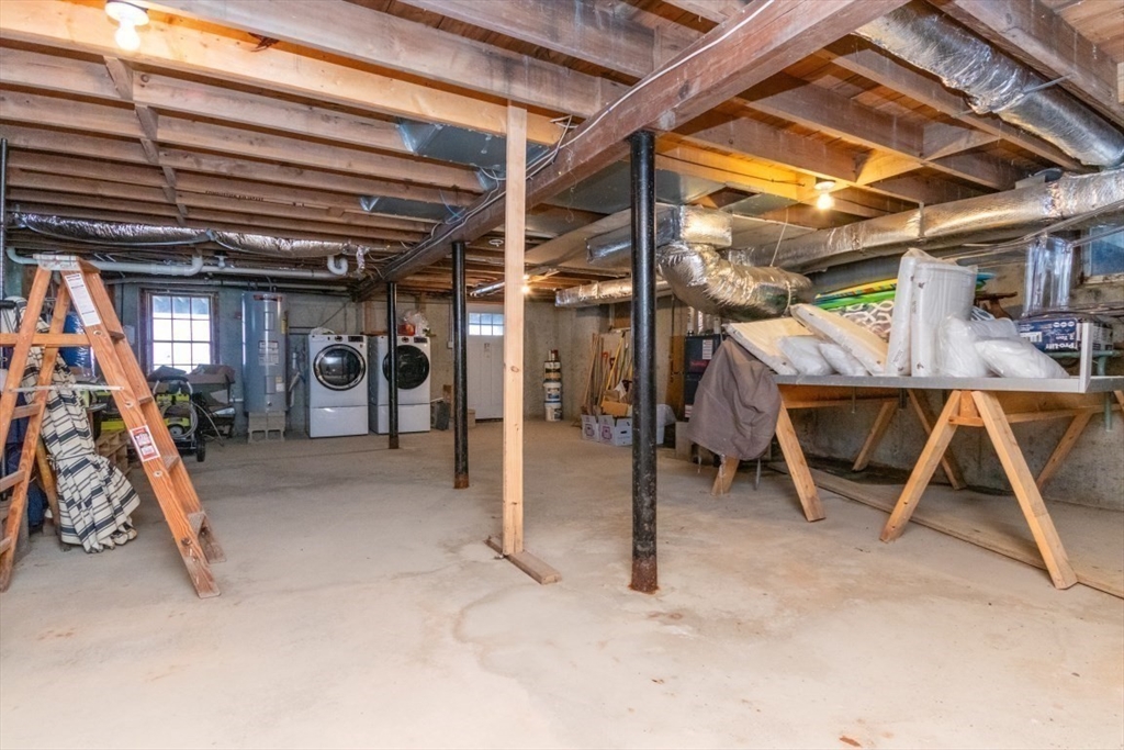 296 Central Avenue Scituate, MA 02050 - Photo 30 of 37 a view of a room with wooden floor