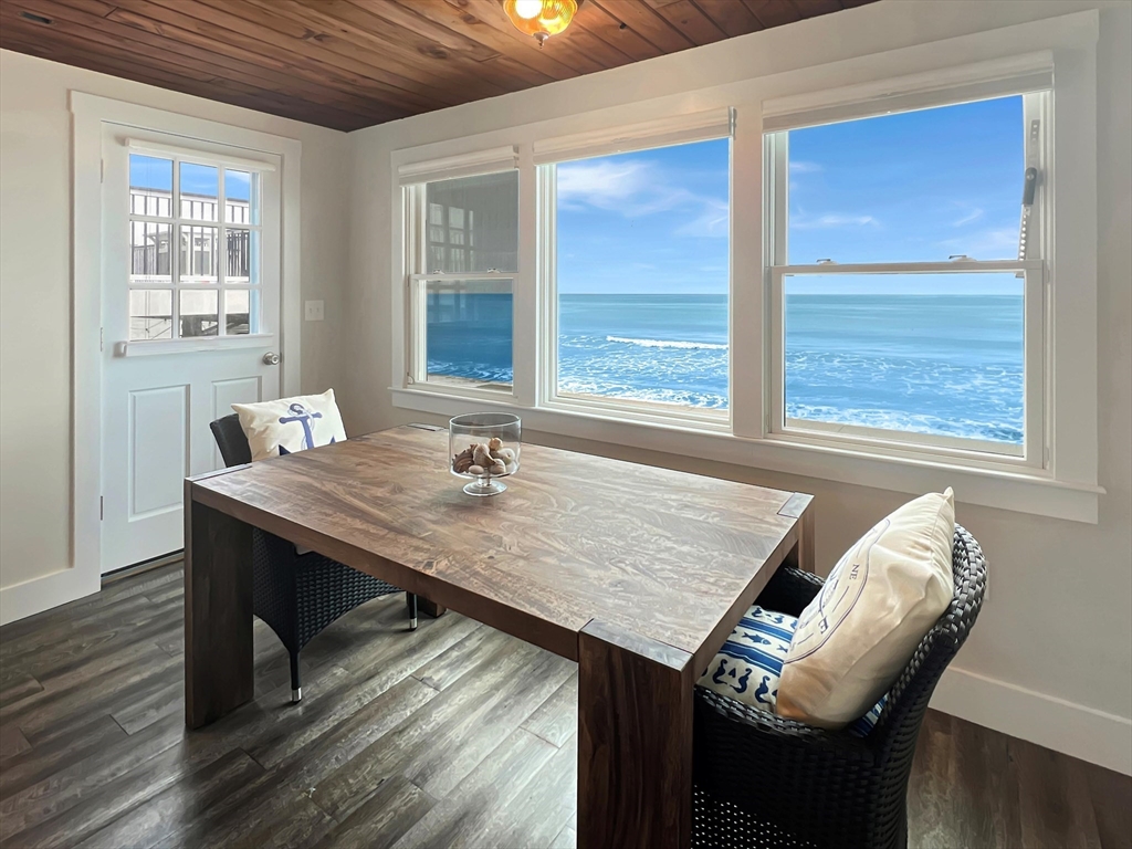 296 Central Avenue Scituate, MA 02050 - Photo 6 of 37 a view of a table and chair in the room
