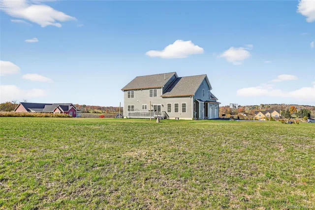 a view of a house with a big yard