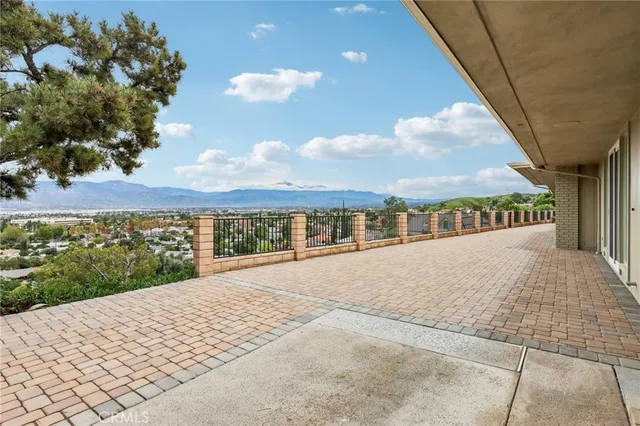 an aerial view of a house with a garden