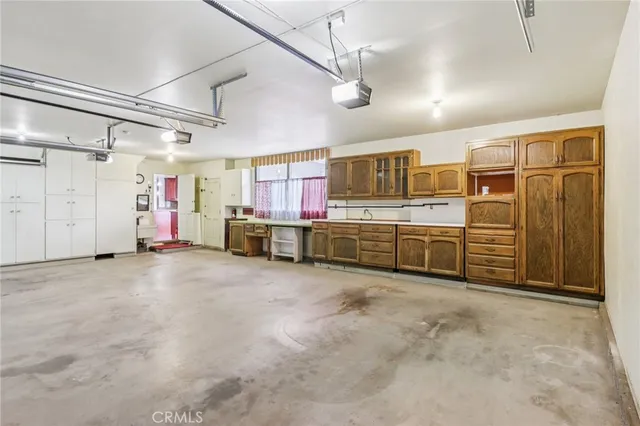 a aerial view of a house with a yard