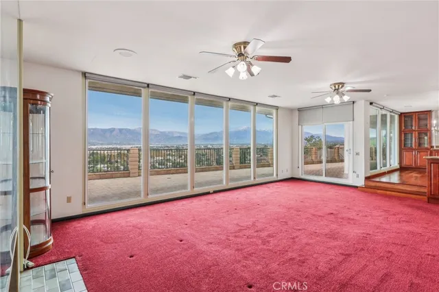 a kitchen with kitchen island stainless steel appliances a stove a sink dishwasher and cabinets with wooden floor