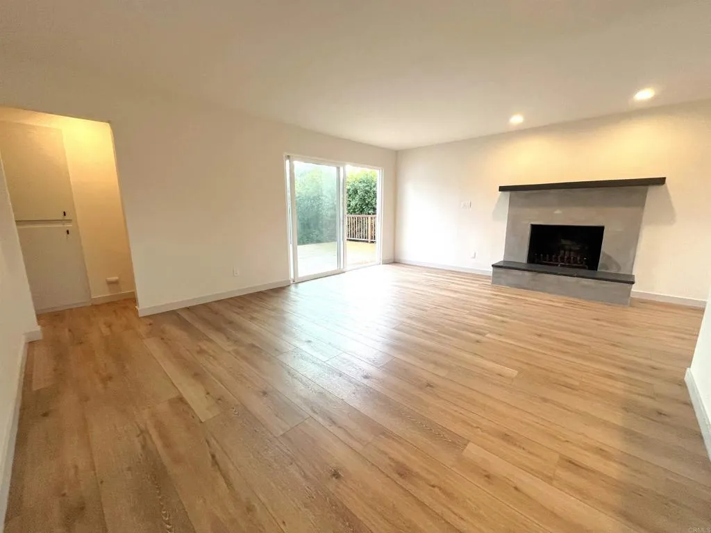 804 Clark Avenue Encinitas, CA 92024 - Photo 19 of 50 a view of an empty room with wooden floor and a window
