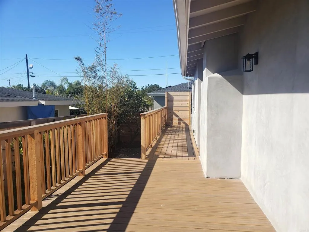 804 Clark Avenue Encinitas, CA 92024 - Photo 9 of 50 a view of balcony with wooden floor and fence