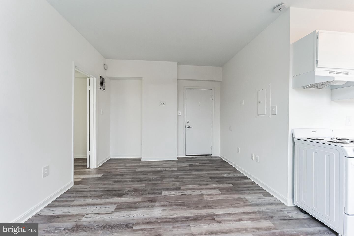1451 Park Road Northwest, Unit 419 Washington, DC 20010 - Photo 3 of 17 a view of a livingroom with wooden floor
