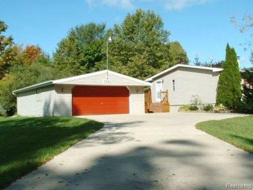 3260 North Mill Road Dryden, MI 48428 - Photo 1 of 16 3260HOUSE_GARAGE.JPG
