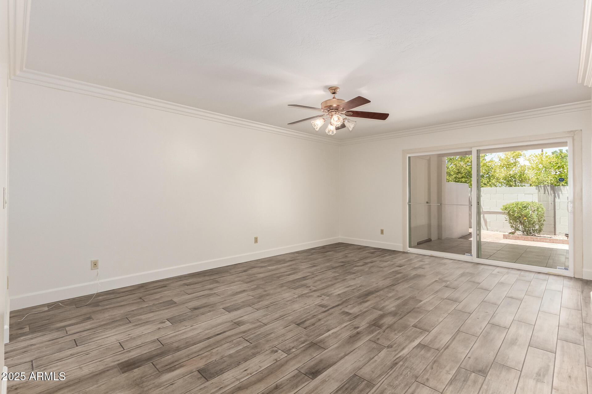 38 East Calavar Road Phoenix, AZ 85022 - Photo 23 of 45 a view of an empty room with a window