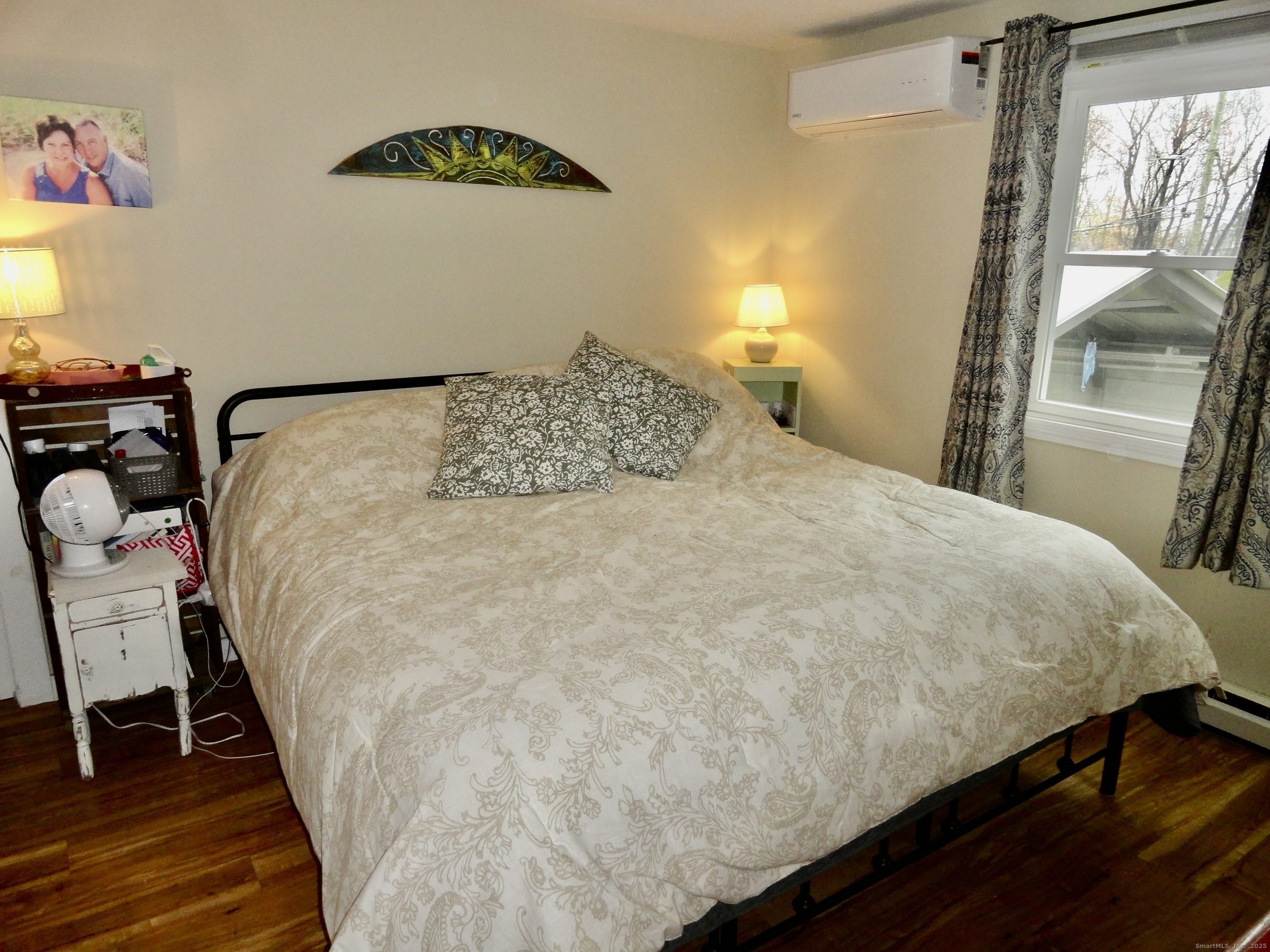 35 Calli Street Torrington, CT 06790 - Photo 13 of 33 a large bed sitting in a bedroom next to a window