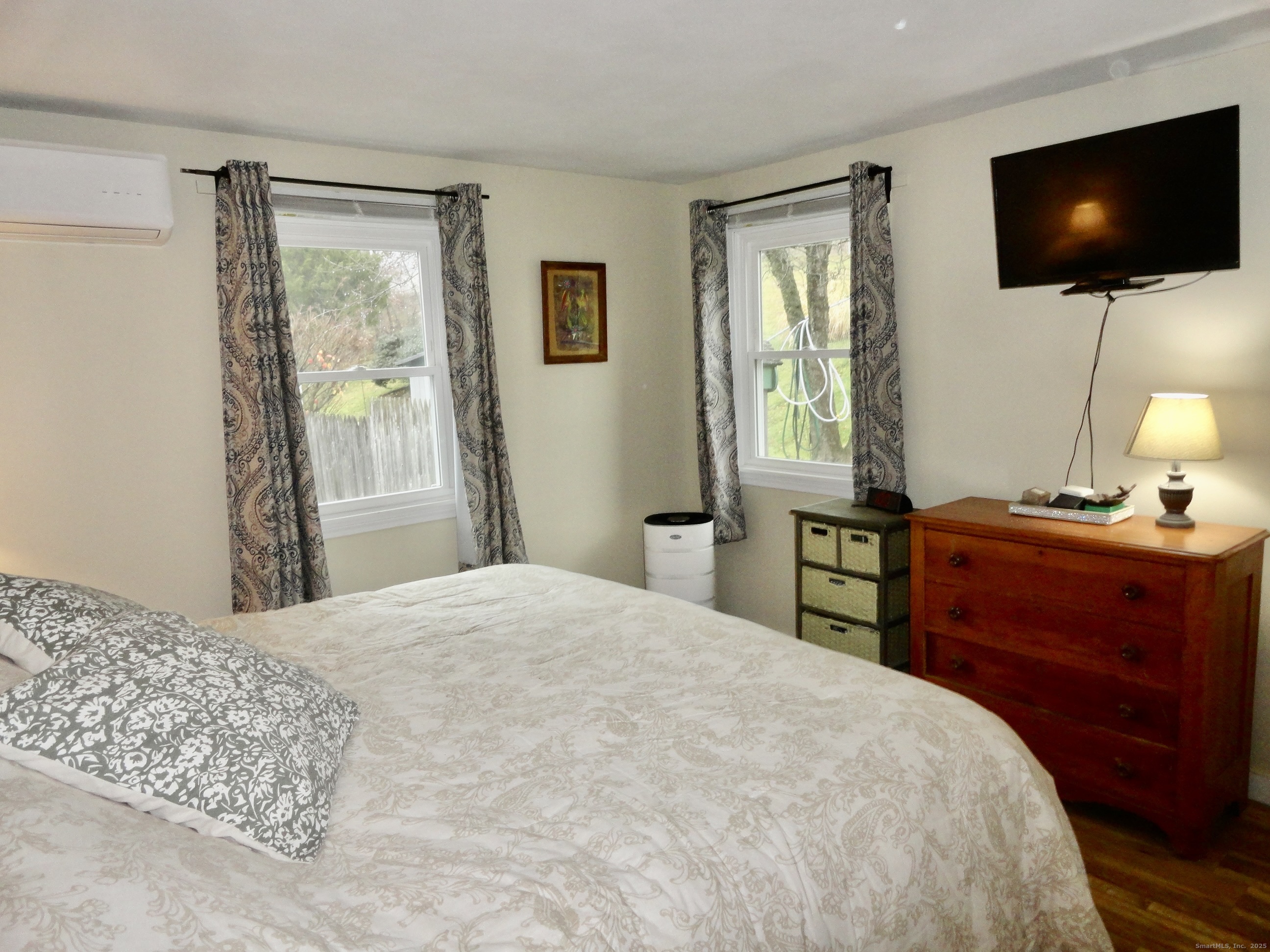 35 Calli Street Torrington, CT 06790 - Photo 15 of 33 a bedroom with a bed and flat screen tv