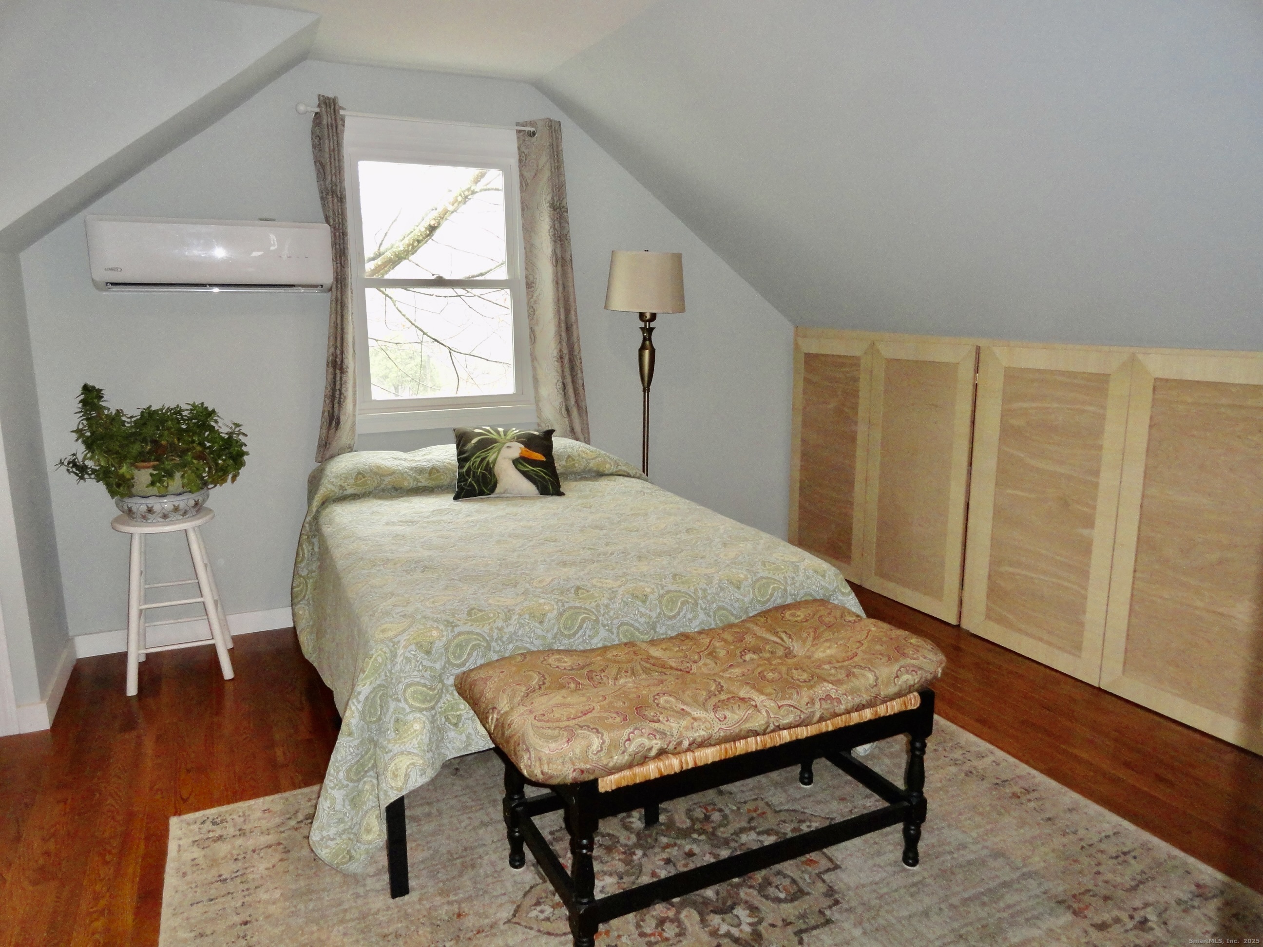 35 Calli Street Torrington, CT 06790 - Photo 17 of 33 a bed sitting in a bedroom next to a window