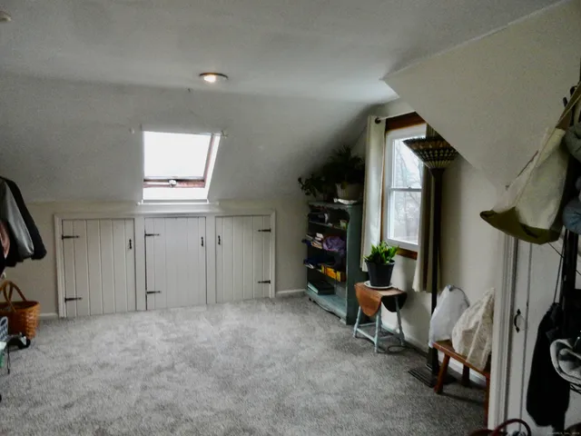 a view of a room with toys and a window