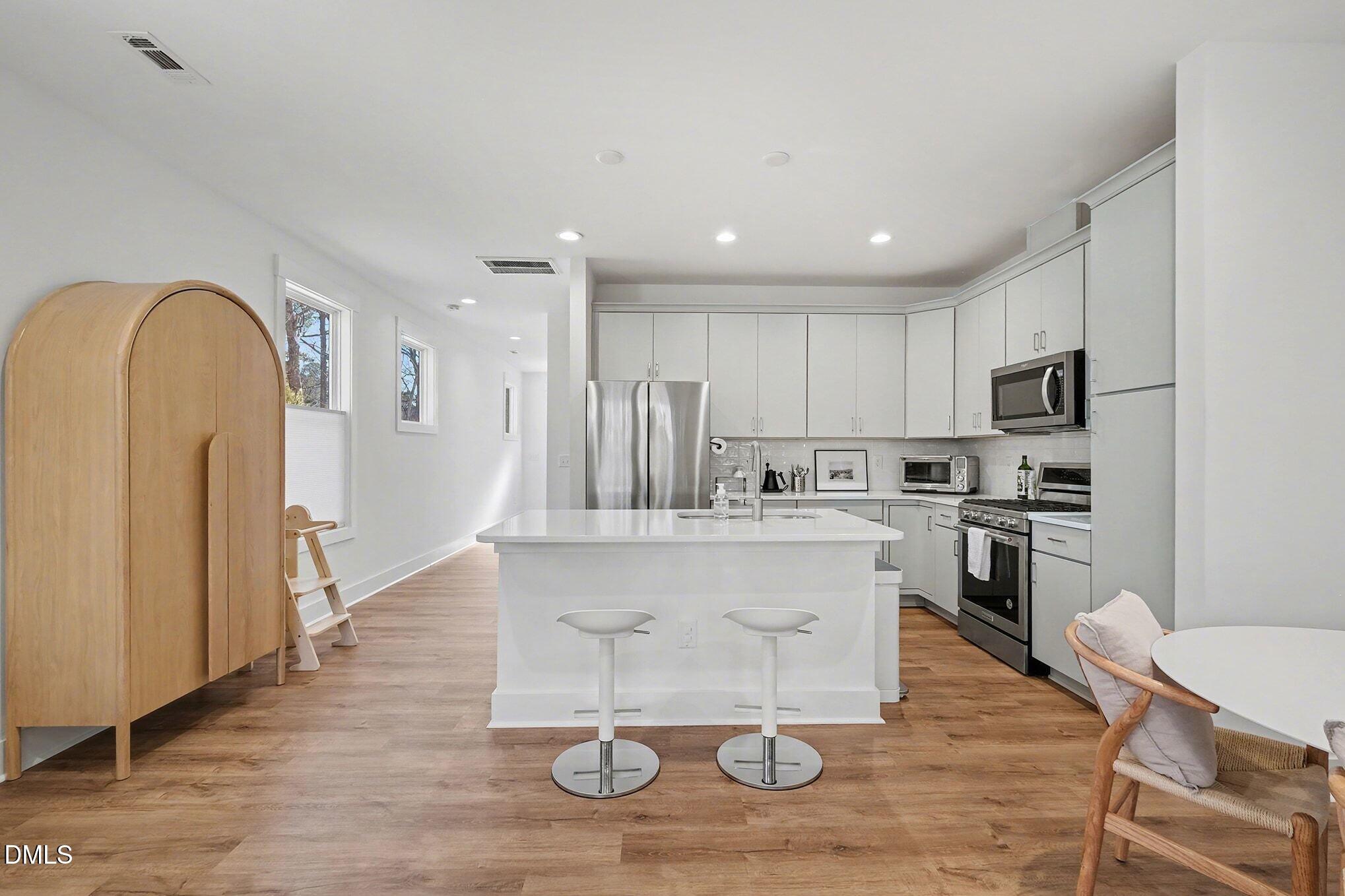 4019 Emerald Green Road Raleigh, NC 27612 - Photo 8 of 36 016_kitchenisland2