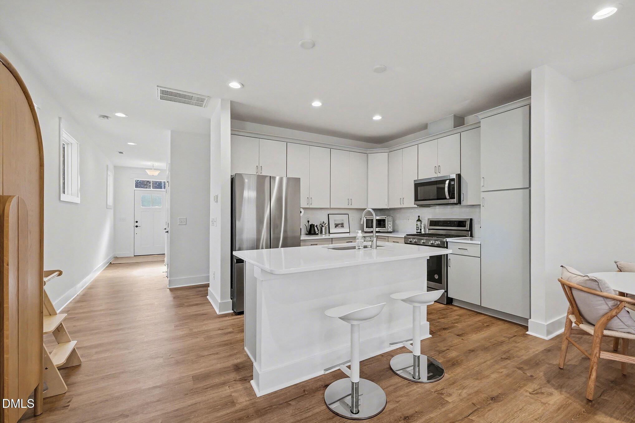 4019 Emerald Green Road Raleigh, NC 27612 - Photo 9 of 36 015_dsckitchisland