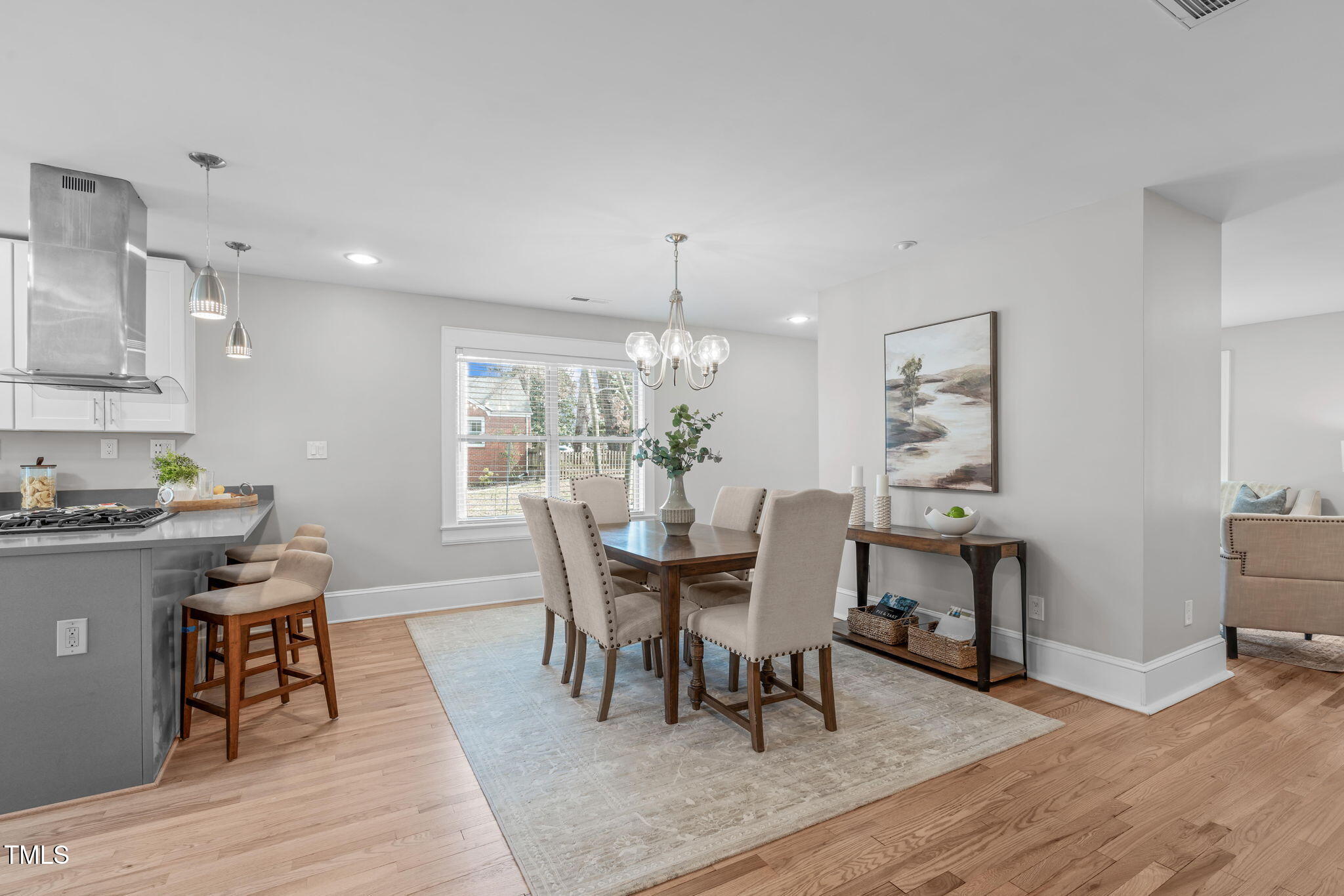 1900 Sunset Avenue Durham, NC 27705 - Photo 17 of 53 a view of a dining room with furniture and wooden floor
