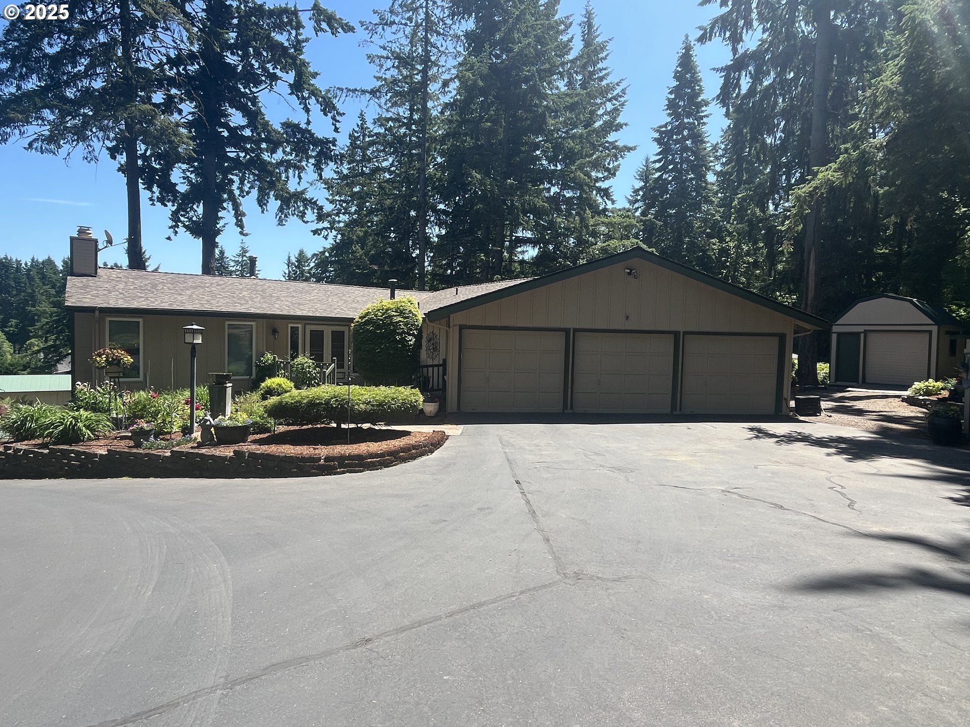 9076 Daleview Road Southeast Salem, OR 97317 - Photo 2 of 45 a front view of a house with yard and trees
