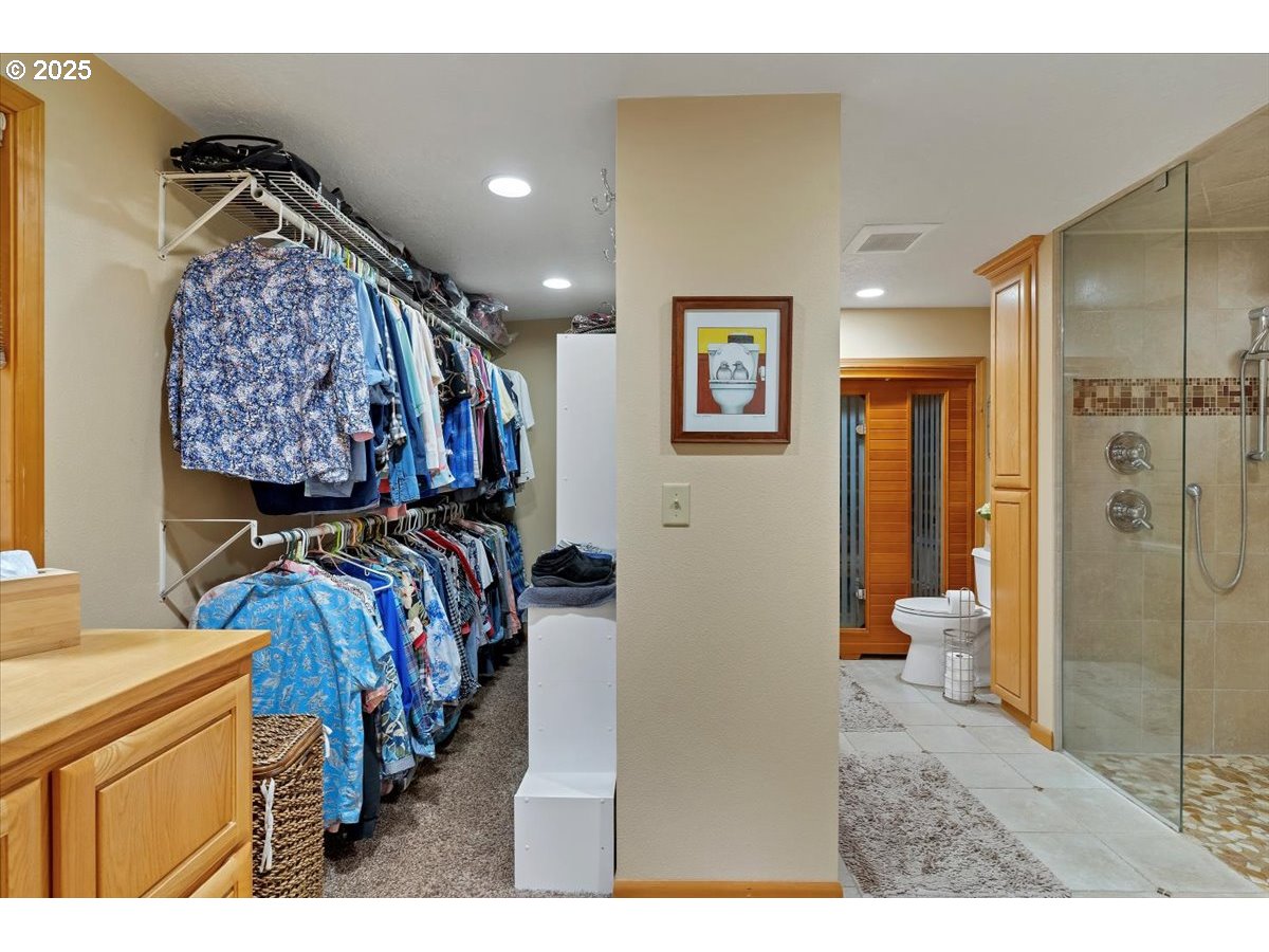 9076 Daleview Road Southeast Salem, OR 97317 - Photo 22 of 45 a bedroom with a bed and a view of bathroom