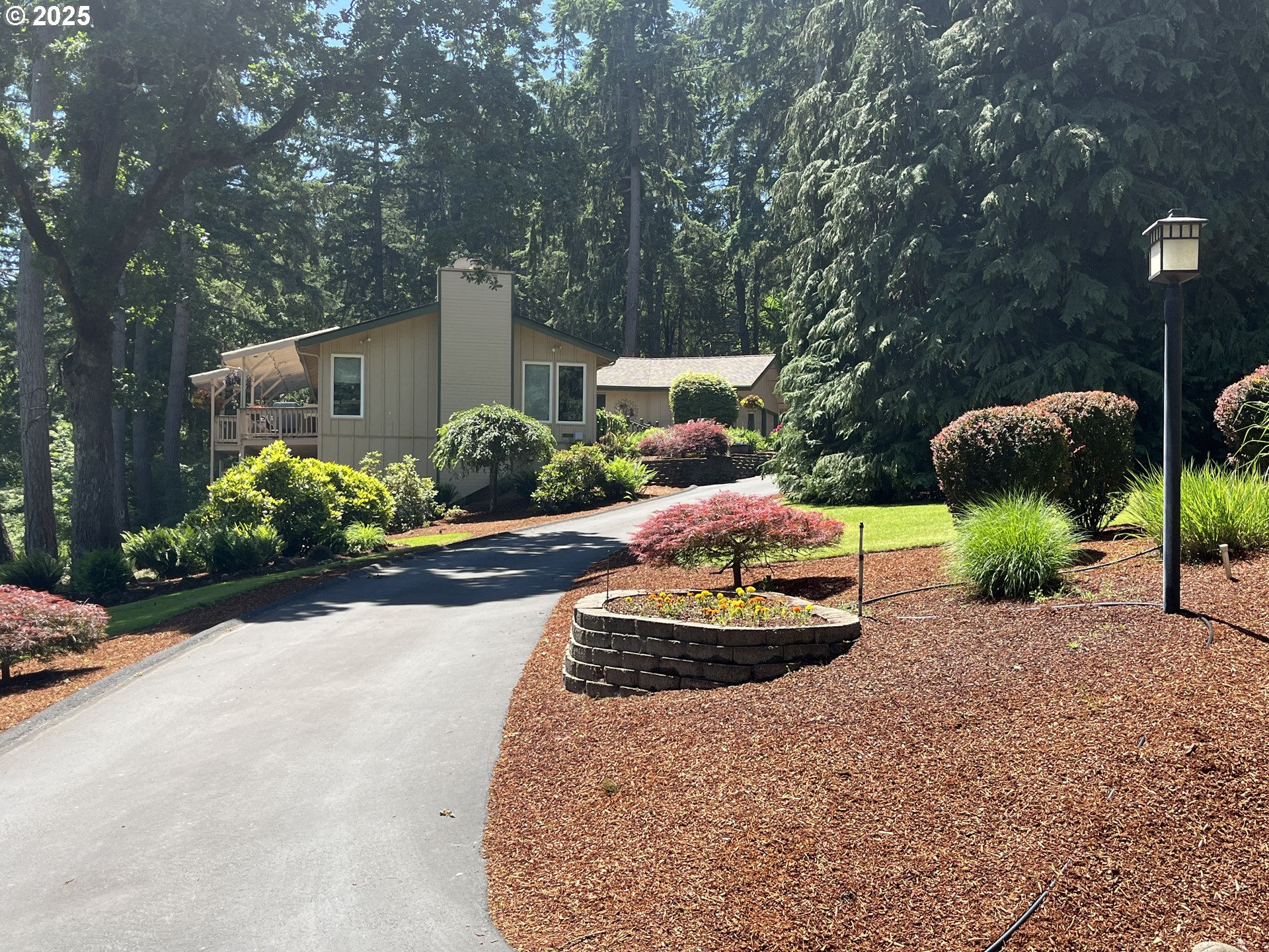 9076 Daleview Road Southeast Salem, OR 97317 - Photo 3 of 45 a front view of a house with a yard and outdoor seating