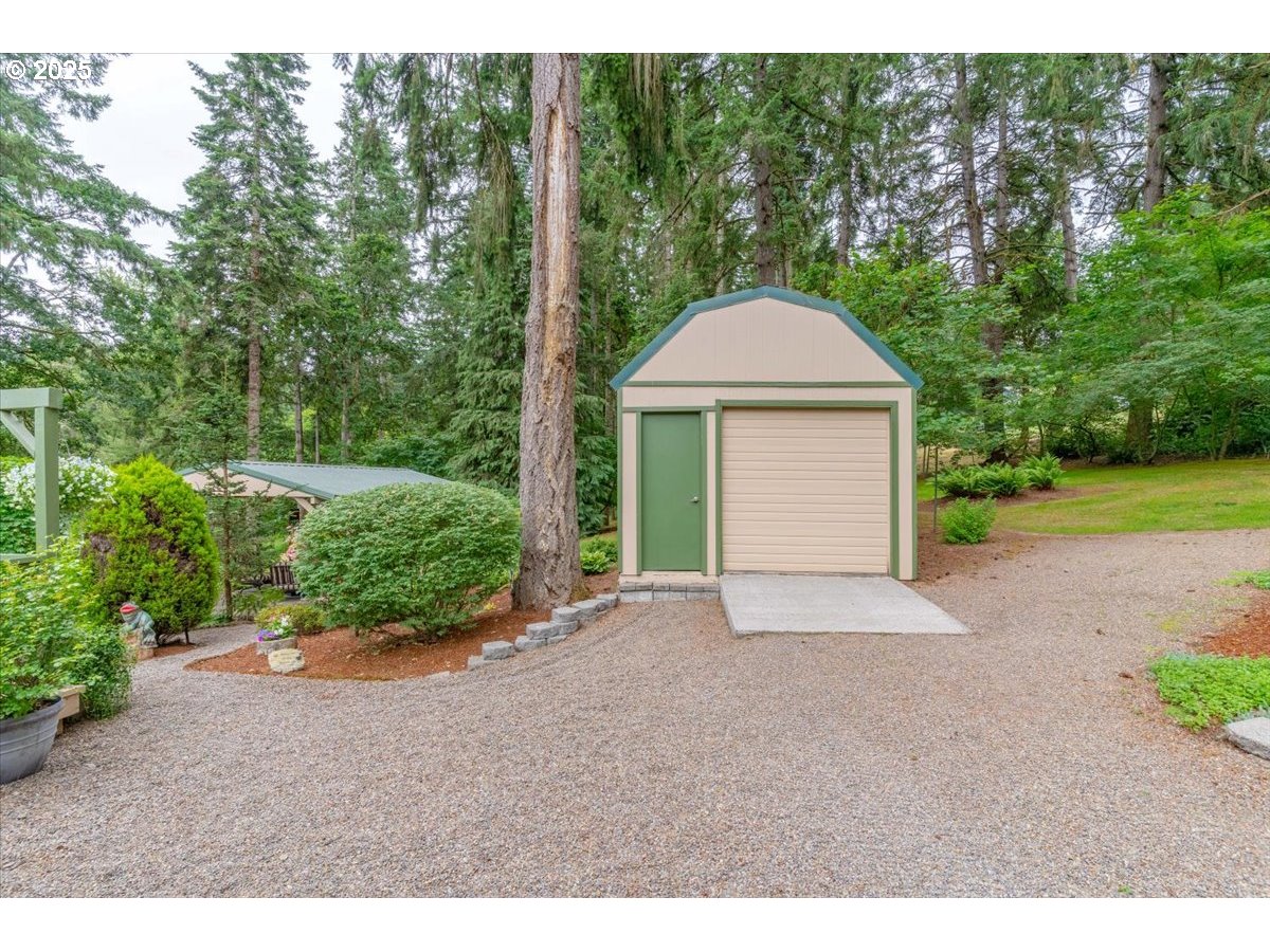 9076 Daleview Road Southeast Salem, OR 97317 - Photo 37 of 45 a view of a house with backyard and garden