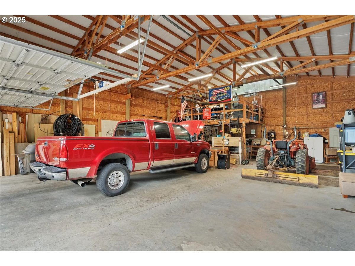 9076 Daleview Road Southeast Salem, OR 97317 - Photo 39 of 45 a view of a garage with parked cars