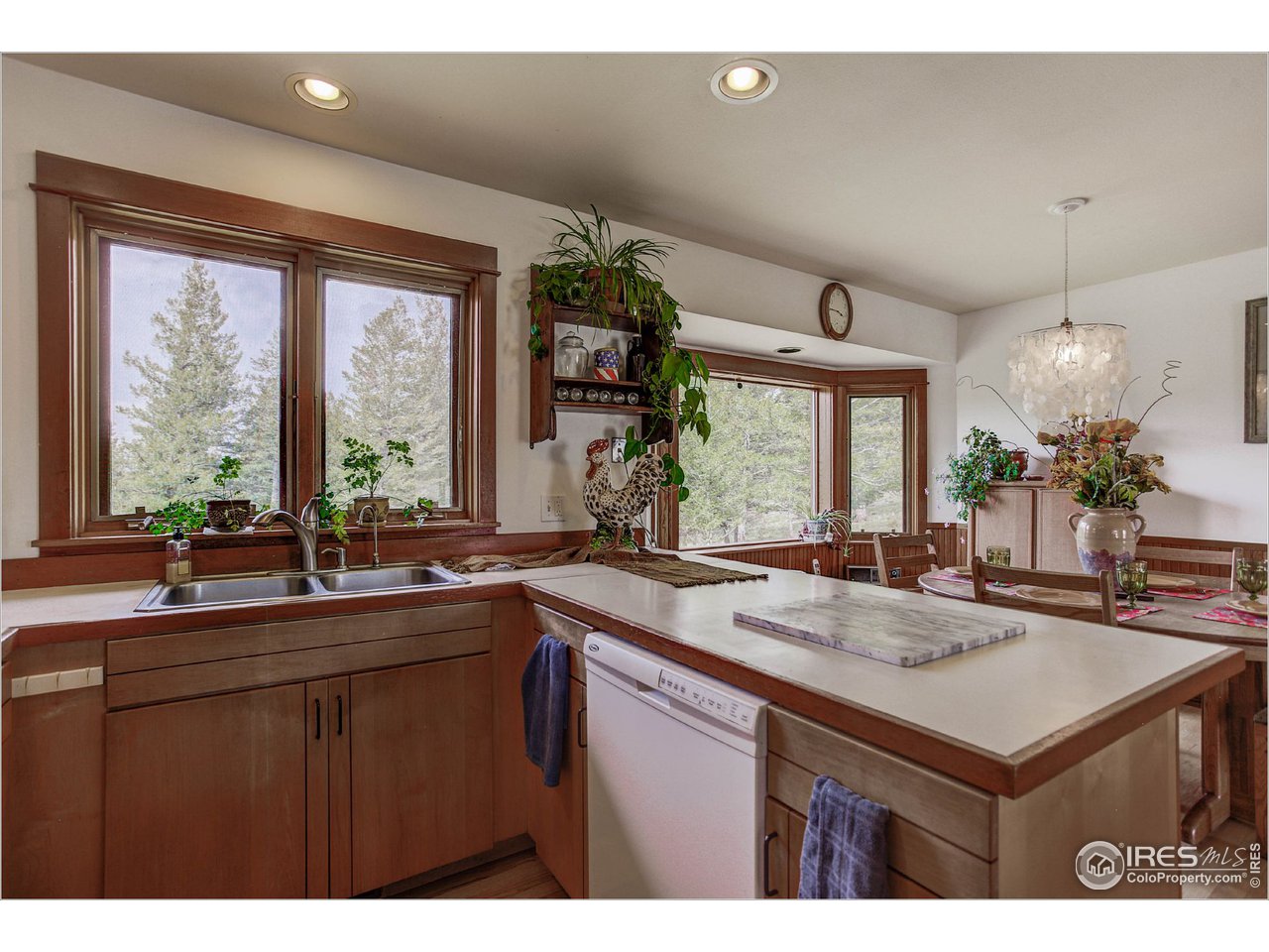 595 Left Fork Road Boulder, CO 80302 - Photo 8 of 19 a kitchen with sink and window