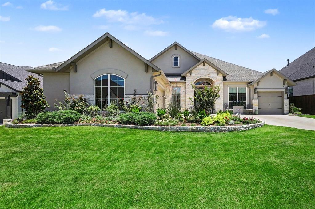 573 Broadleaf Way Haslet, TX 76052 - Photo 4 of 35 a front view of a house with a yard