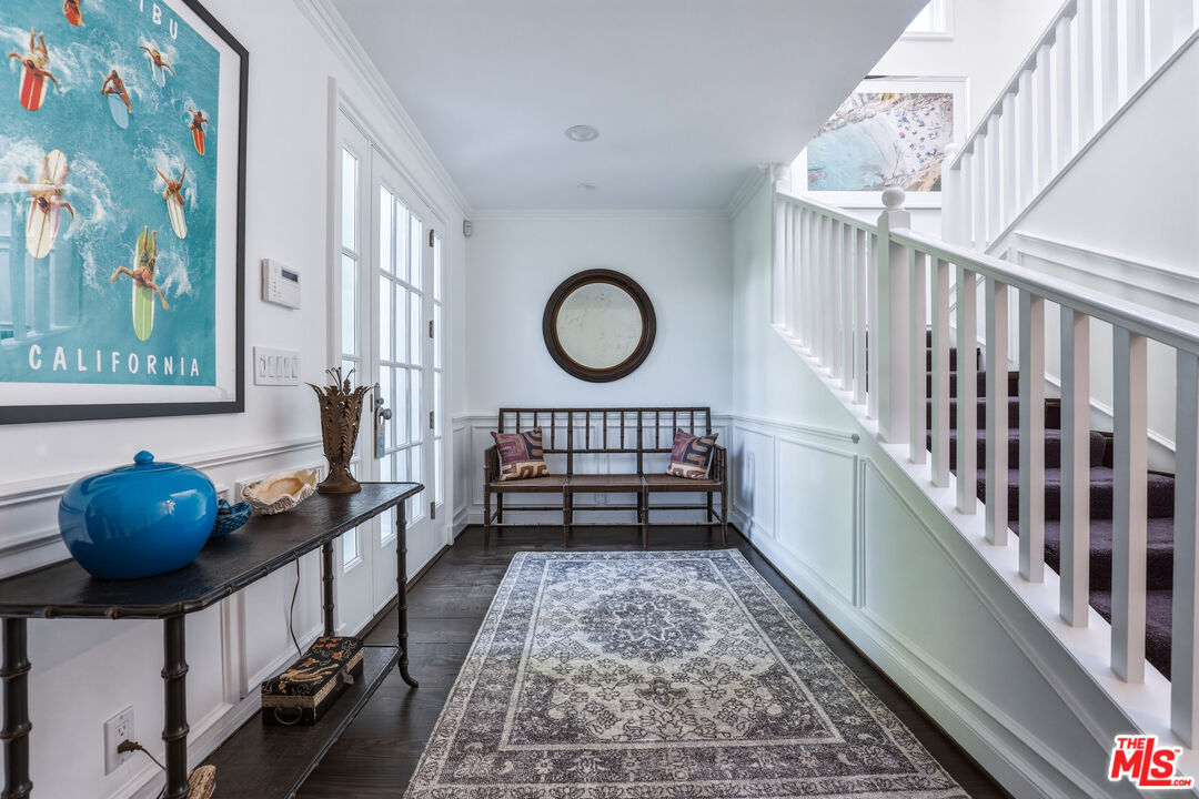 30810 Broad Beach Road Malibu, CA 90265 - Photo 11 of 55 a bedroom with furniture and a rug