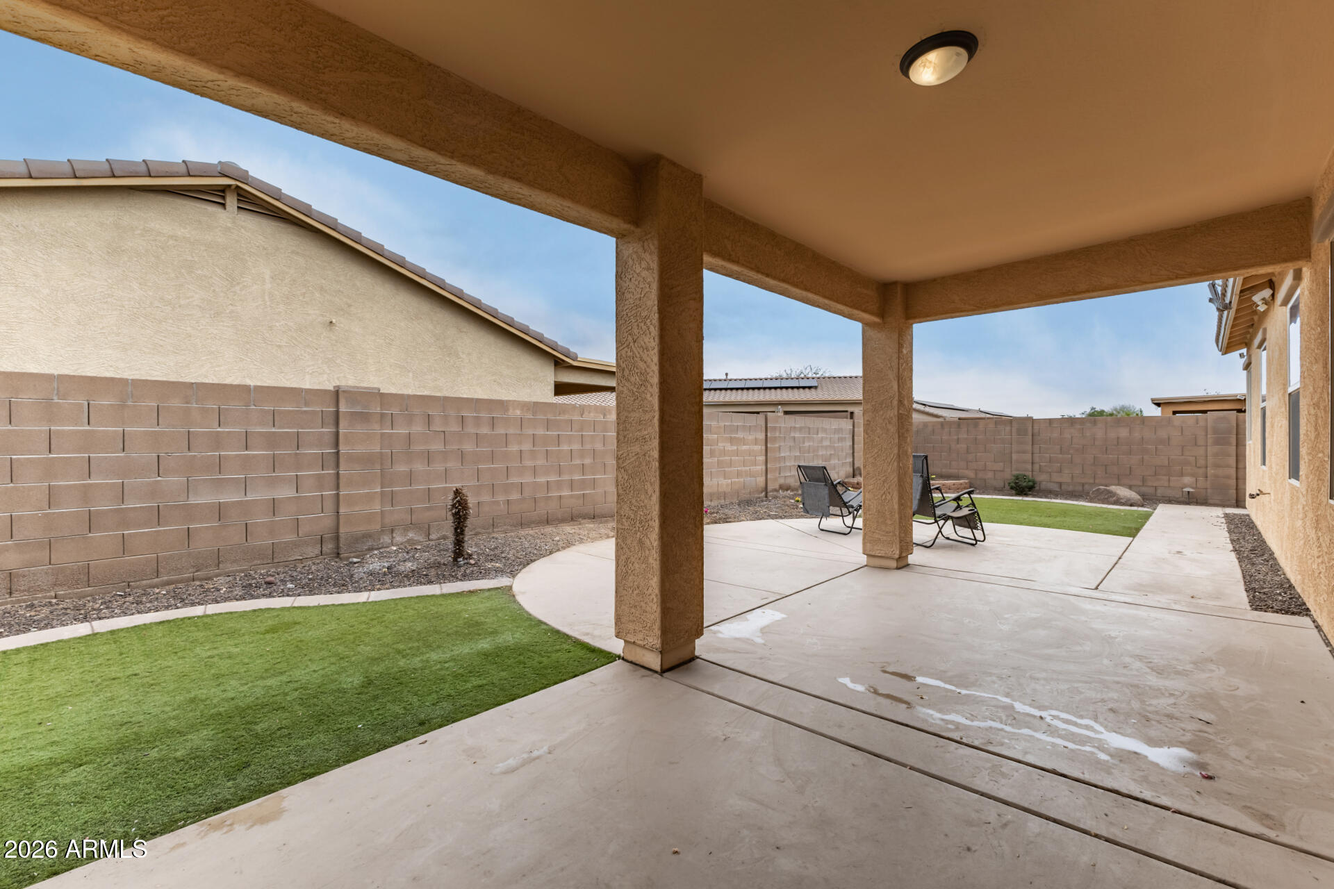 5718 West Pecan Road Laveen, AZ 85339 - Photo 31 of 37 a view of a backyard with a garden