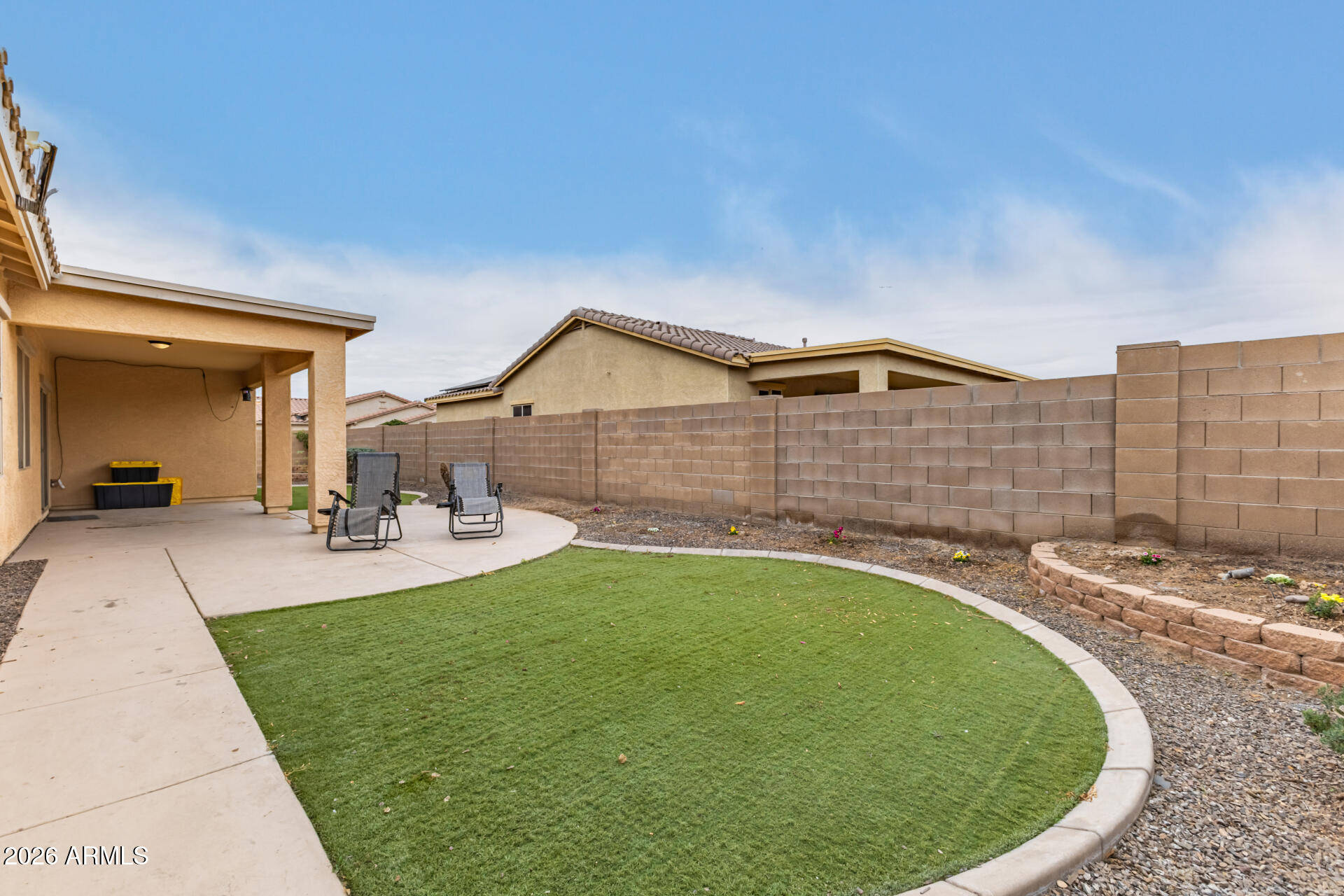 5718 West Pecan Road Laveen, AZ 85339 - Photo 33 of 37 a view of a house with swimming pool and porch