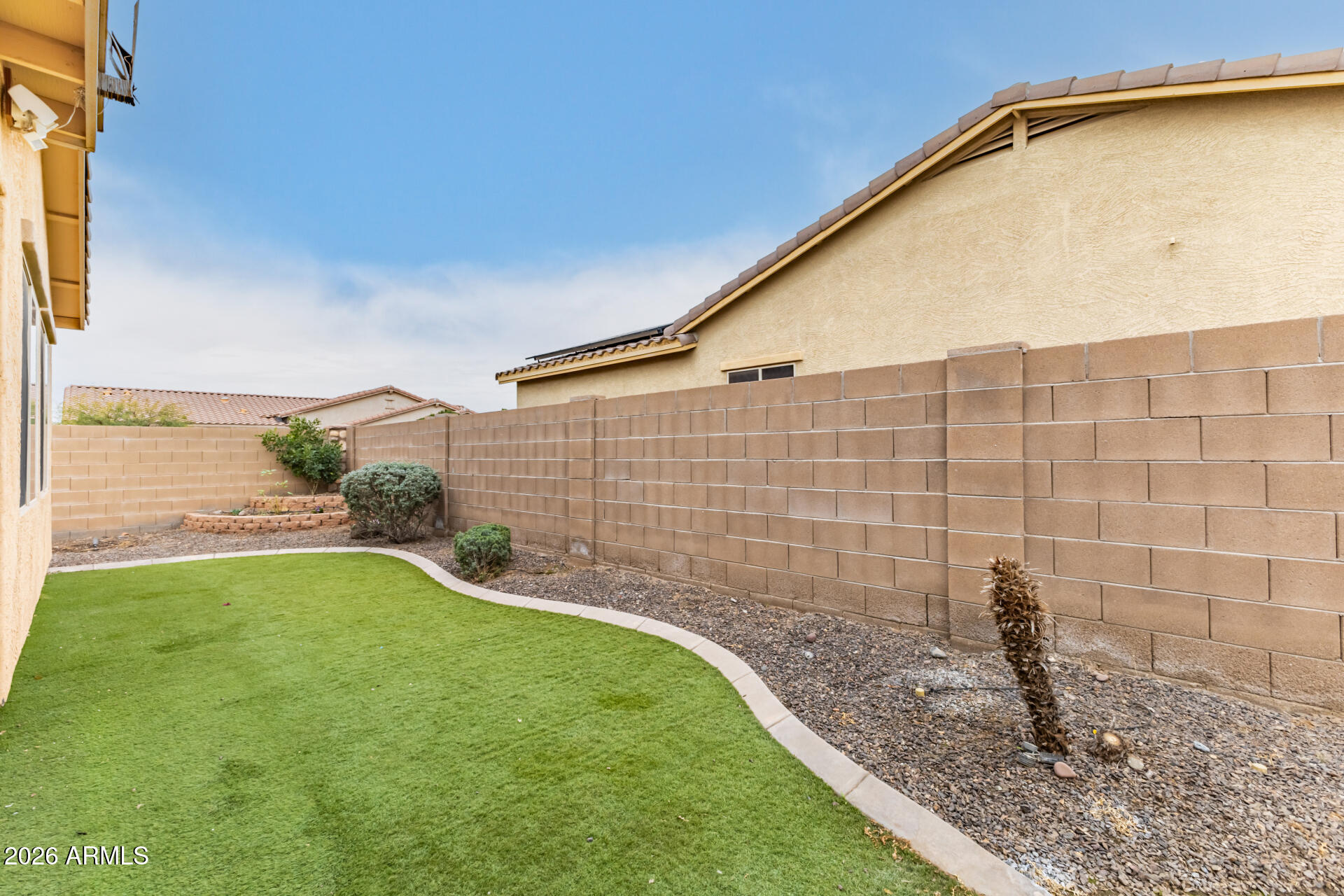 5718 West Pecan Road Laveen, AZ 85339 - Photo 35 of 37 a view of a backyard with a garden