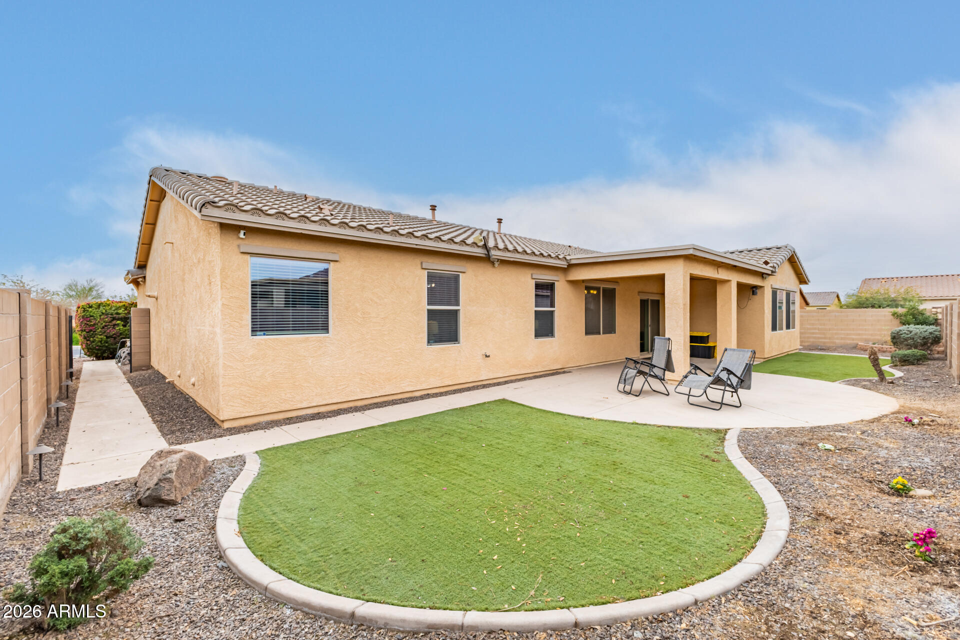 5718 West Pecan Road Laveen, AZ 85339 - Photo 37 of 37 a view of a house with a backyard