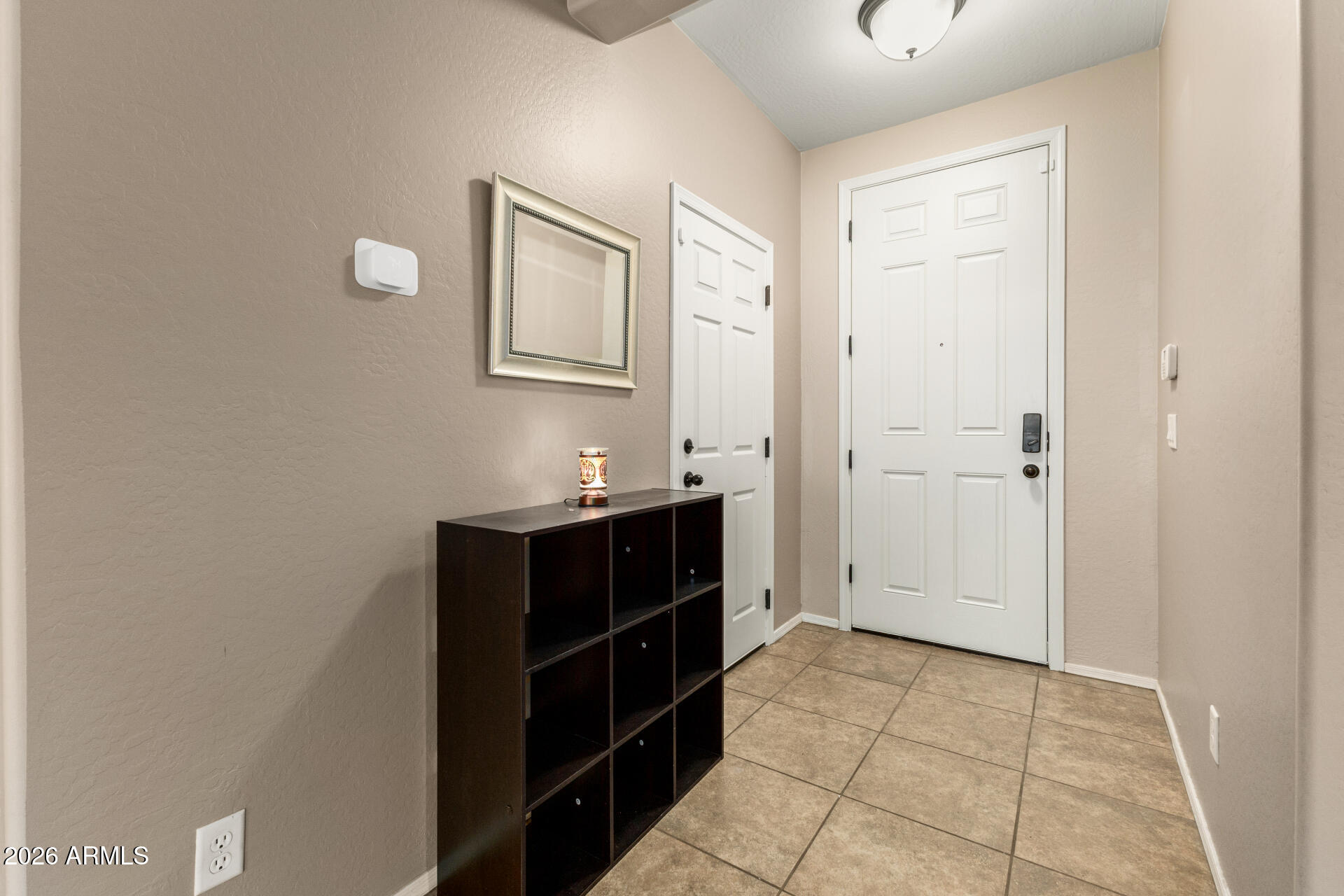 5718 West Pecan Road Laveen, AZ 85339 - Photo 4 of 37 a bathroom with a sink and a mirror