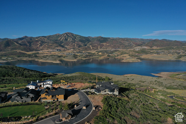 10677 North Reflection Ridge, Unit 1 Hideout, UT 84036 - Photo 10 of 41 Aerial view of property and surrounding area with a water and mountain view and nearby suburban area