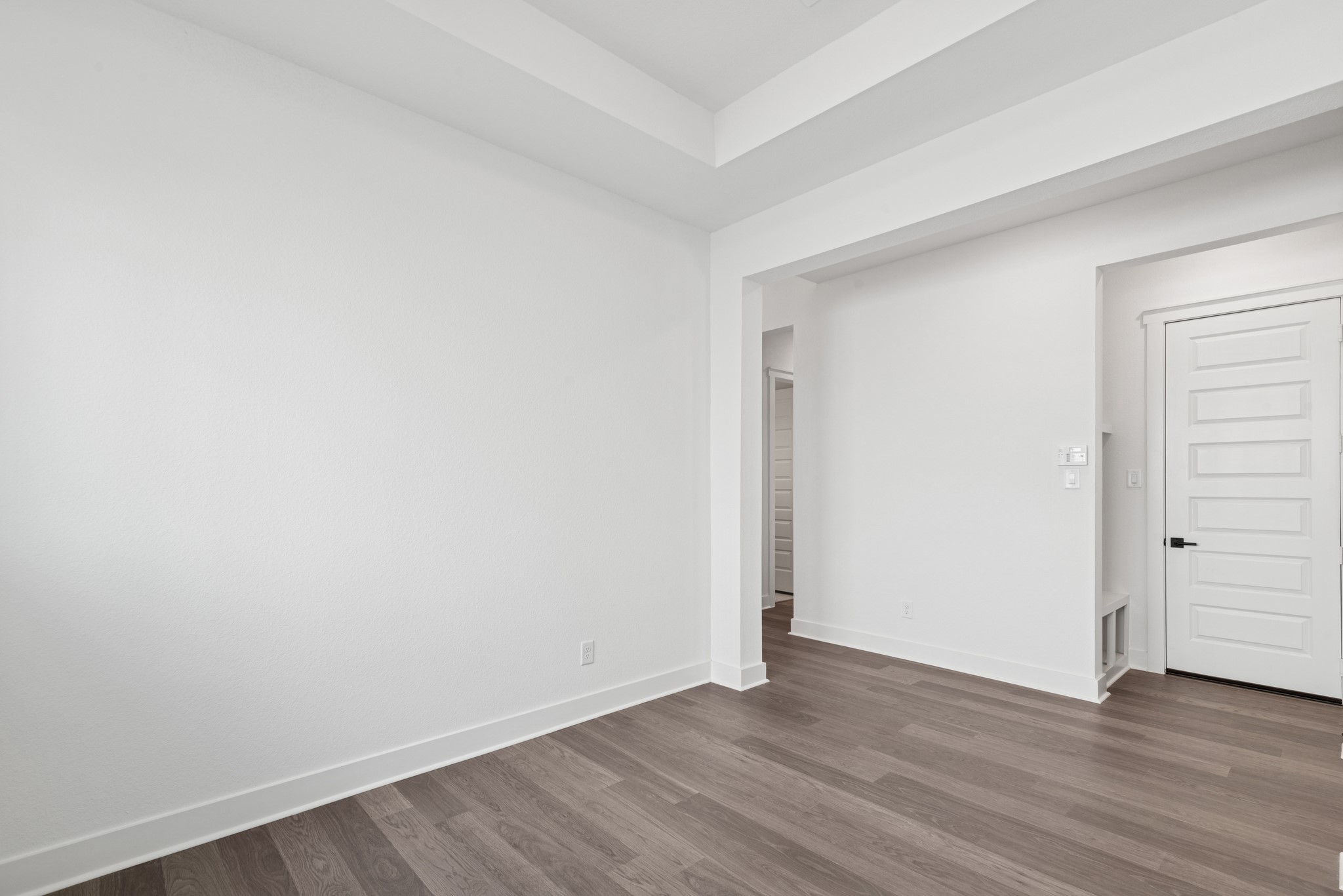16138 Rita Road Conroe, TX 77302 - Photo 18 of 50 a view of an empty room with wooden floor
