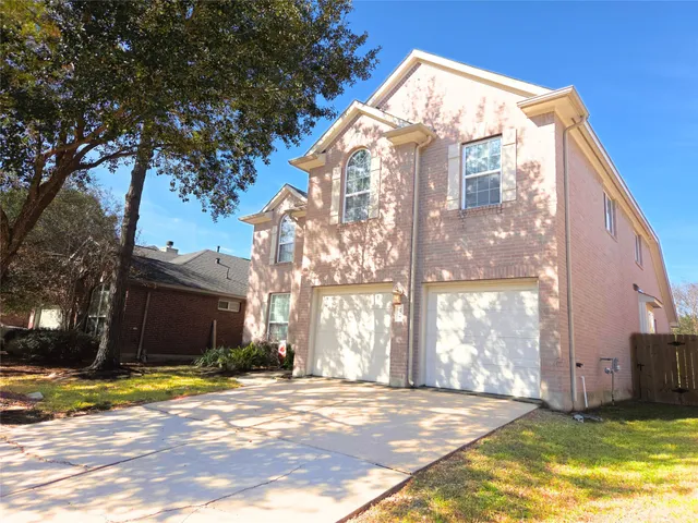 a view of an empty room with a ceiling fan