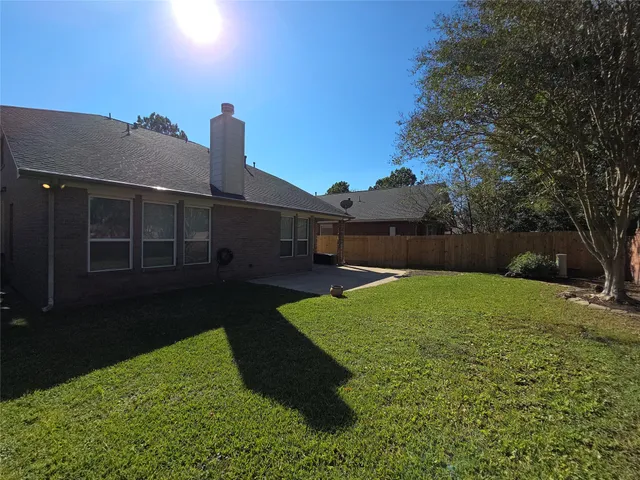 a view of a backyard with a garden