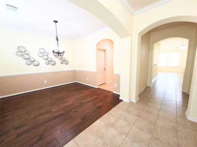 a kitchen with a sink stove and refrigerator