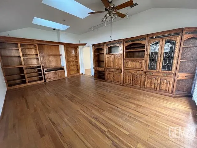a view of a livingroom with wooden floor
