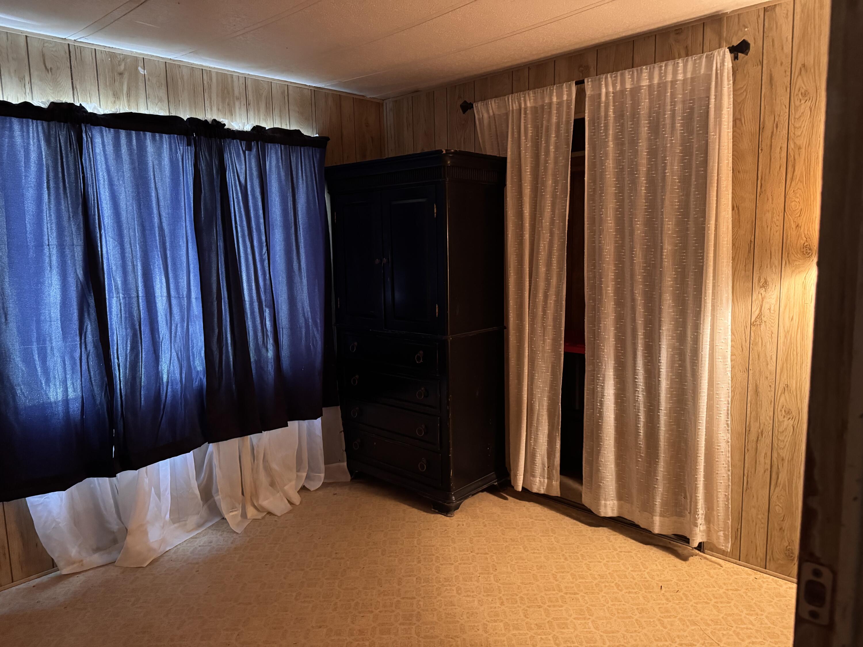 34614 Sprague River Road Sprague River, OR 97639 - Photo 12 of 24 a bed room with a bed and a mirror