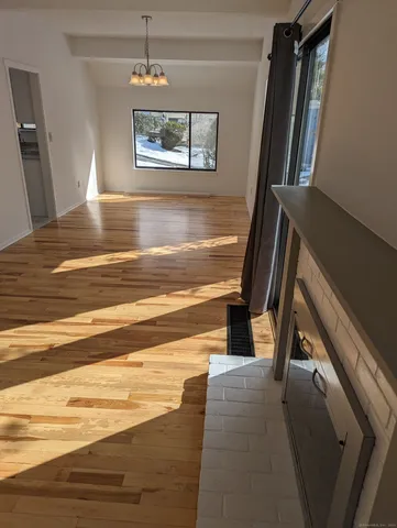 a view of a hallway with front door