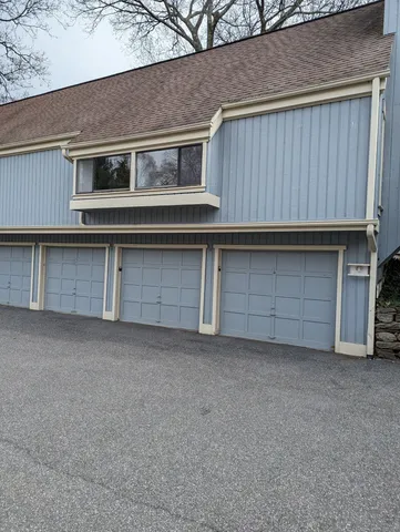 a house view with a garage