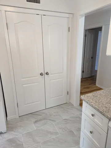 a view of an empty walk in closet