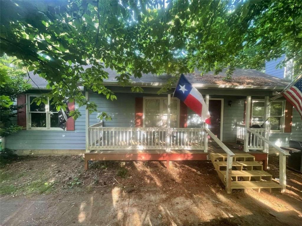 630 Hood Road Talking Rock, GA 30175 - Photo 1 of 1 a front view of a house with a porch