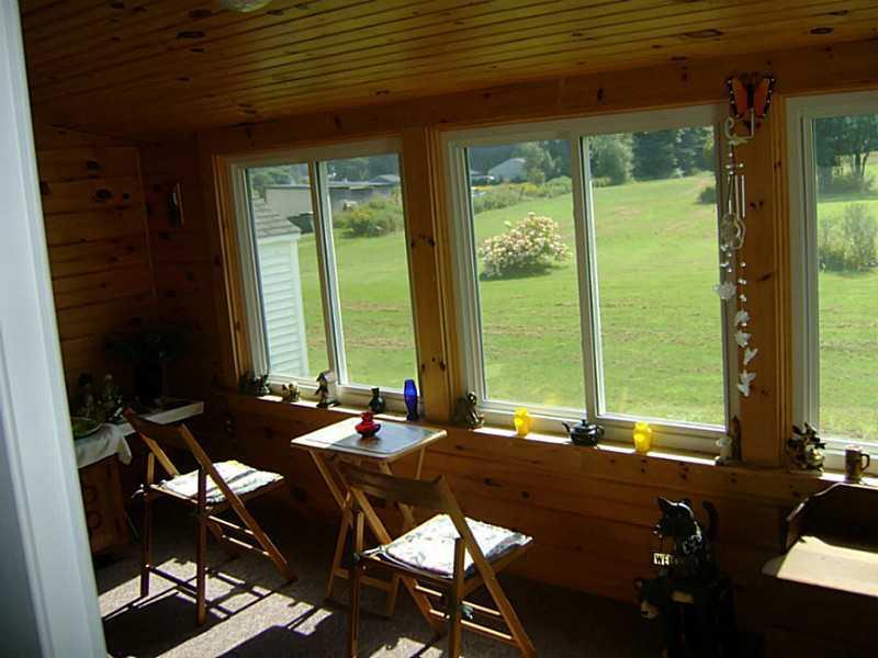 154 Mountain Road Arundel, ME 04046 - Photo 28 of 35 Enclosed Porch.