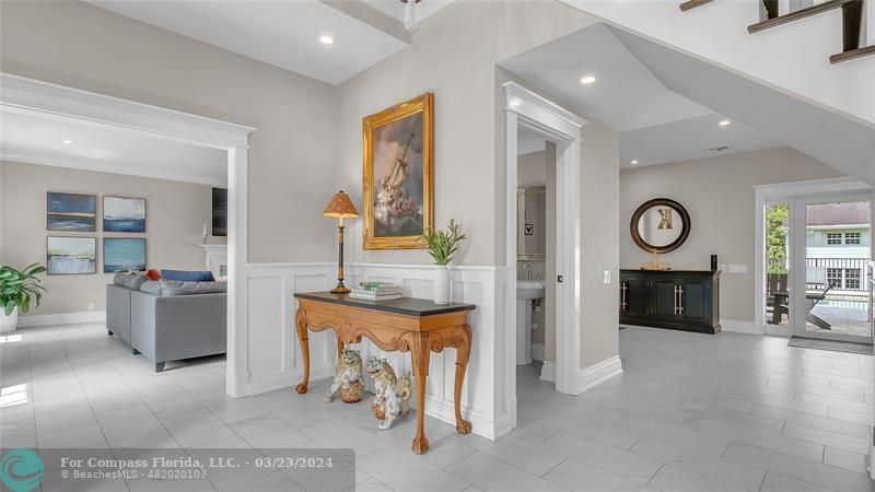 8585 Ranch Road Parkland, FL 33067 - Photo 11 of 69 a living room with furniture a fireplace and a table